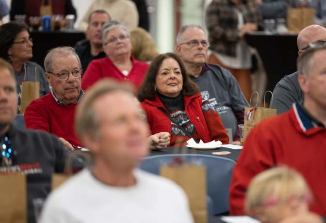 alumni at an assembly