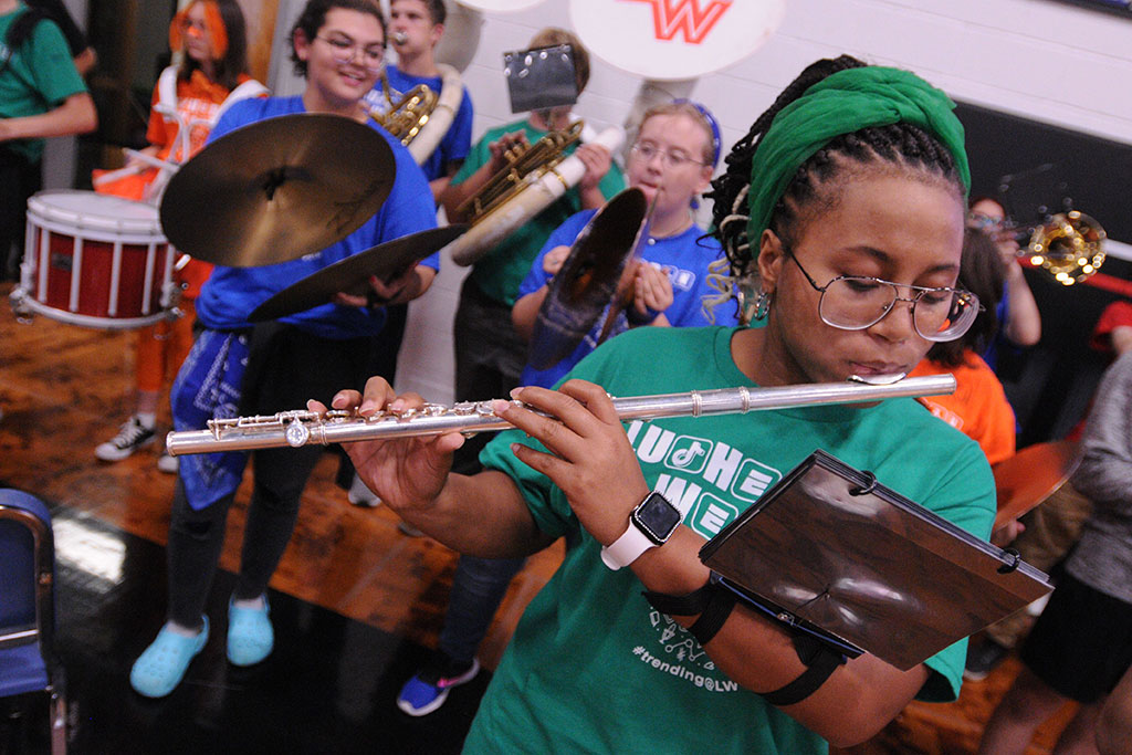 student playing instrument