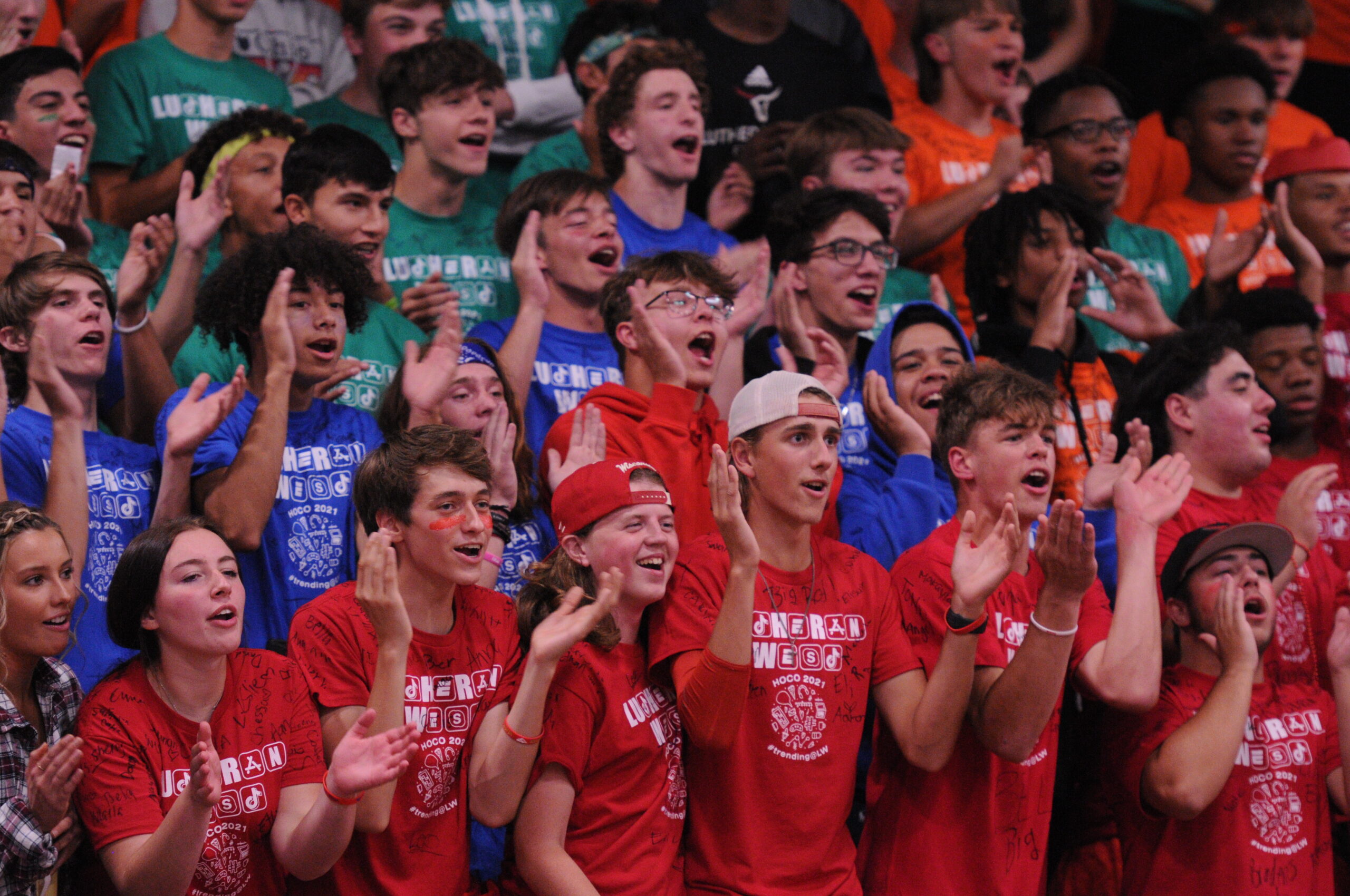 group of students cheering at an event